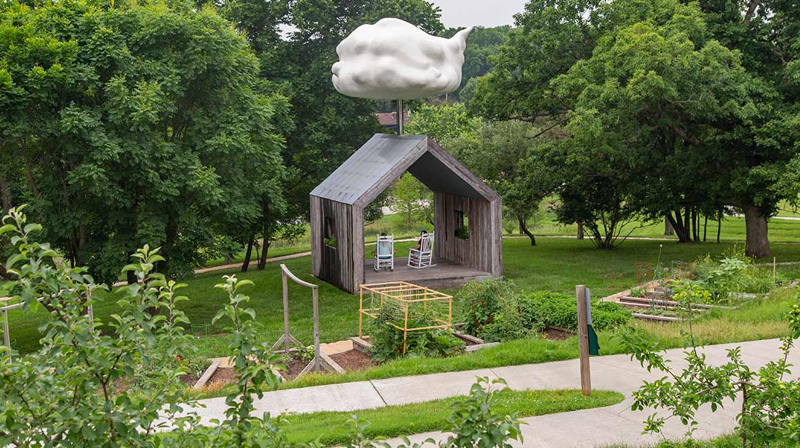 wooden house with cloud sculpture in Springfield MO